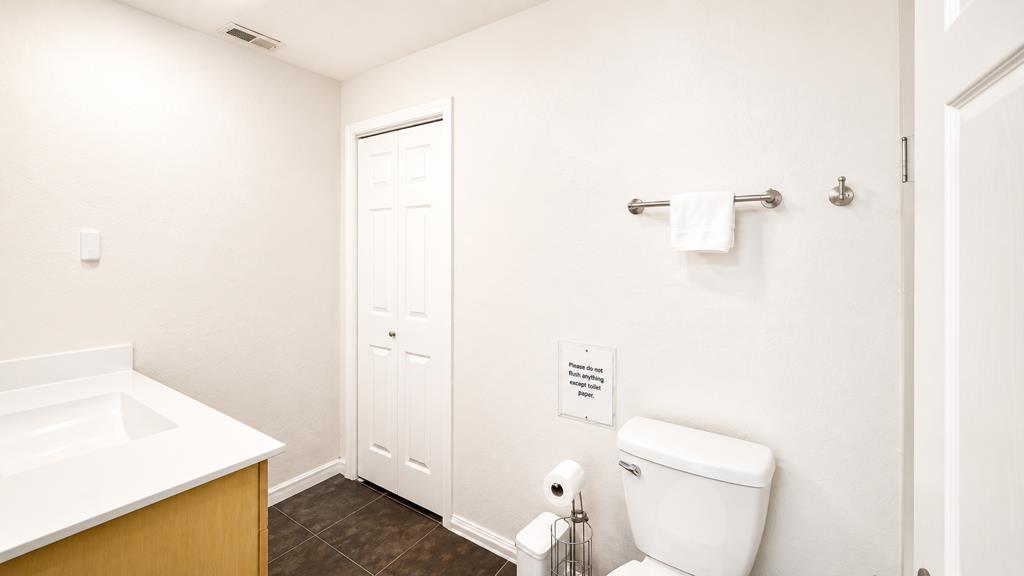 1281 Traynor Road Concord, CA 94520 - Photo 28 of 41 a bathroom with a sink a toilet and shower