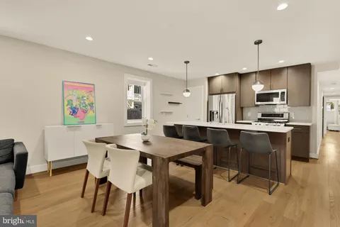 a view of a dining room with furniture