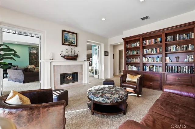 a bathroom with a sink and mirror with toilet