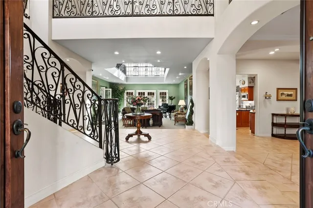 a view of a hallway with dining area
