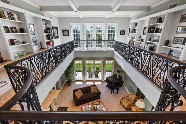 a bathroom with a sink a toilet and a large mirror