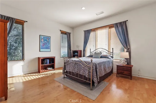 a living room with furniture a fireplace and a window