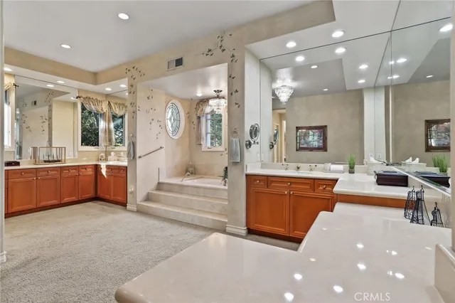 a front view of a house with a yard table and chairs