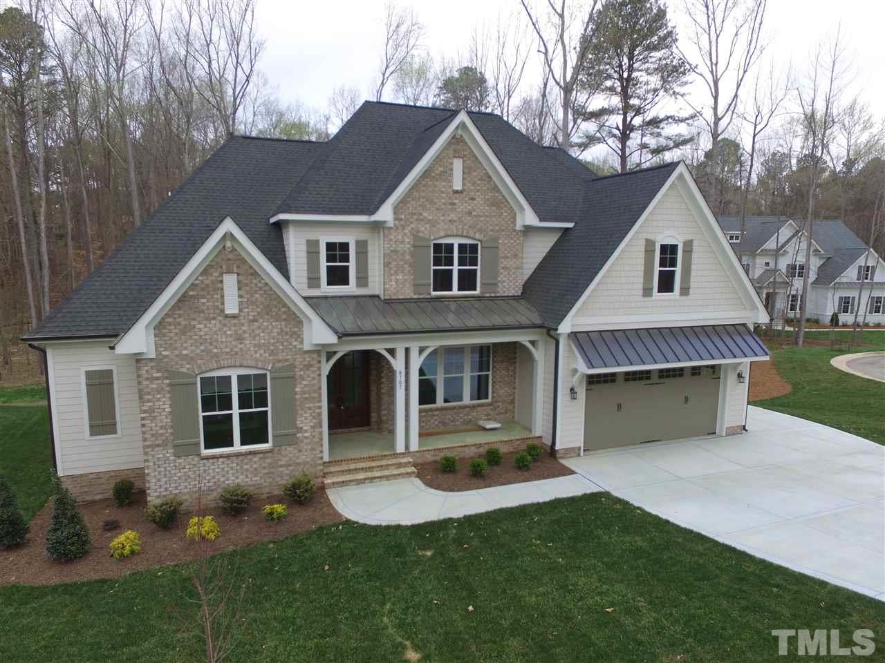 8707 Duckview Court Raleigh, NC 27613 - Photo 3 of 25 a front view of a house with garden