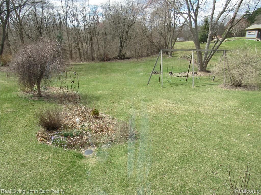 920 Hemingway Road Lake Orion, MI 48362 - Photo 8 of 19 LARGE SWING SET