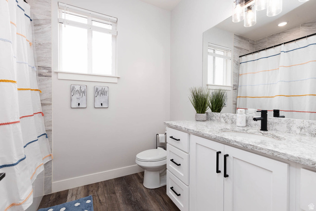 186 West 580 North Redmond, UT 84652 - Photo 21 of 74 Bathroom featuring vanity, a shower with curtain, and dark wood-style floors