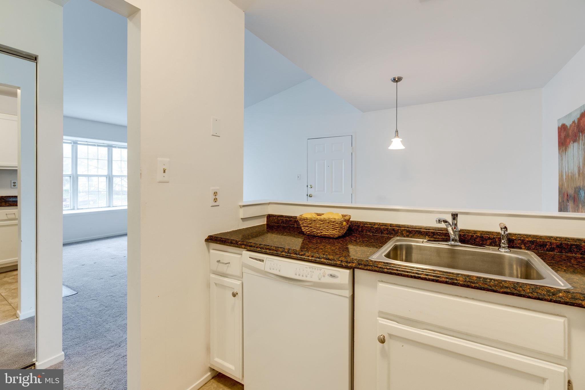 7800 D Harrowgate Circle, Unit 130 Springfield, VA 22152 - Photo 20 of 48 Cook and converse with guests all at the same time
