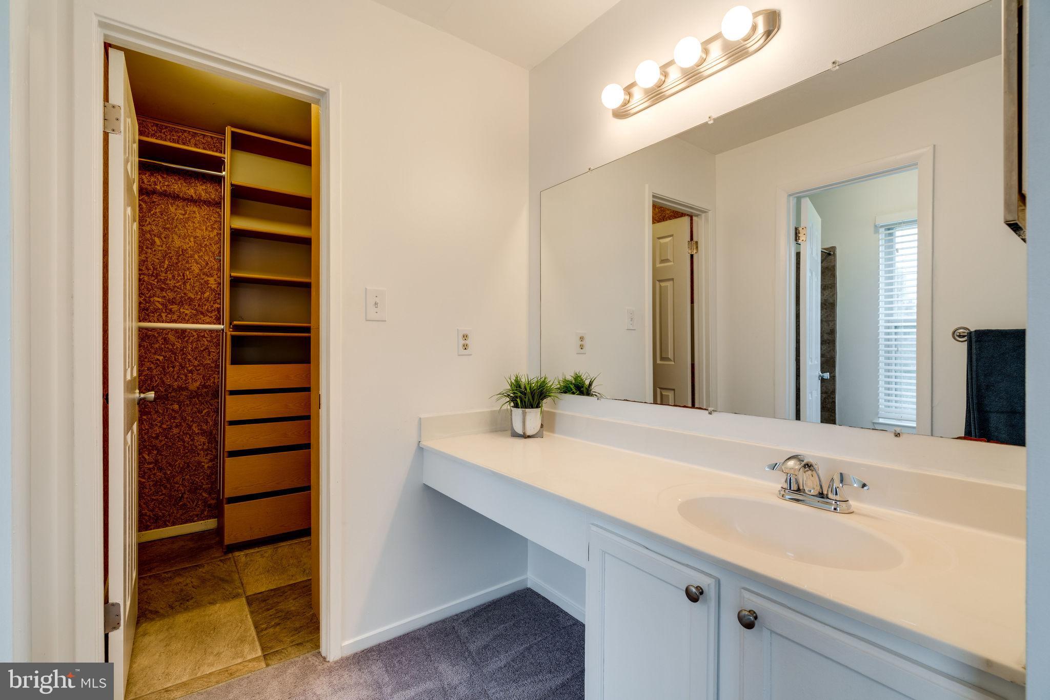 7800 D Harrowgate Circle, Unit 130 Springfield, VA 22152 - Photo 30 of 48 Updated master bath with beautifully designed WIC