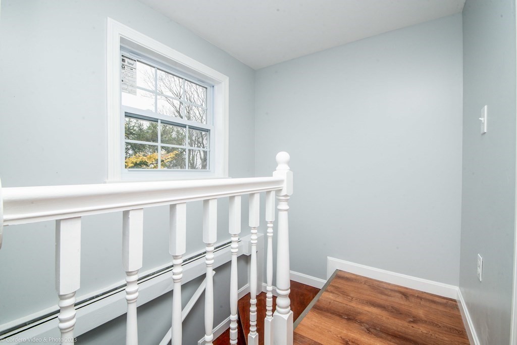 452 Tecumseh Street Fall River, MA 02721 - Photo 20 of 26 a bedroom with furniture and a window