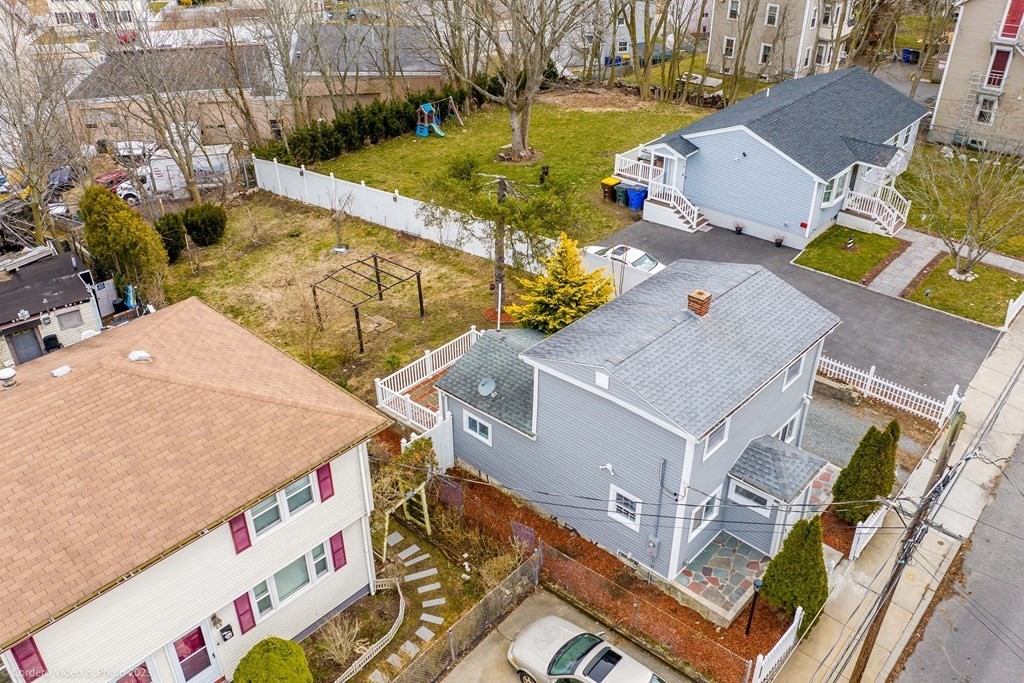 452 Tecumseh Street Fall River, MA 02721 - Photo 6 of 26 an aerial view of a house with a ocean view