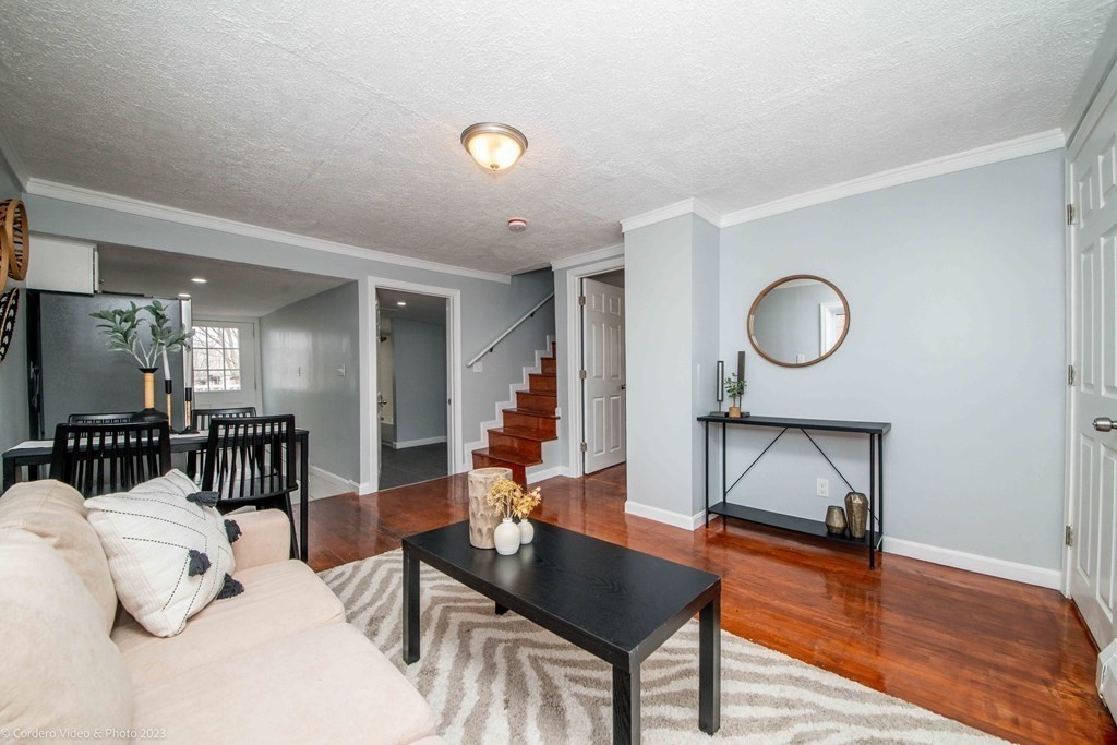 452 Tecumseh Street Fall River, MA 02721 - Photo 8 of 26 a living room with furniture