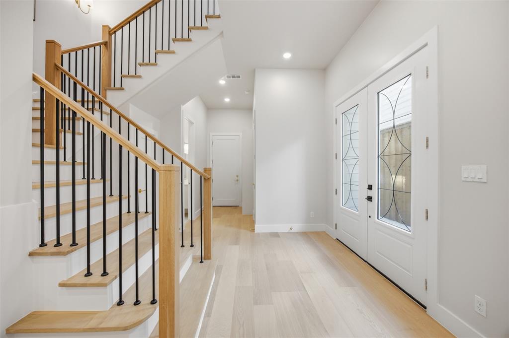 4615 Rusk Avenue Dallas, TX 75204 - Photo 7 of 40 a view of entryway with wooden floor