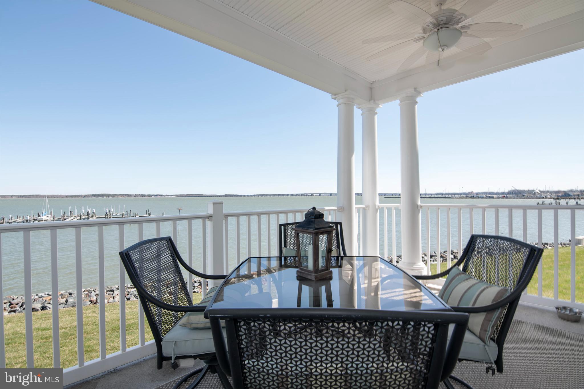 3 Oakley Street, Unit 201 Cambridge, MD 21613 - Photo 27 of 41 a view of a balcony with furniture