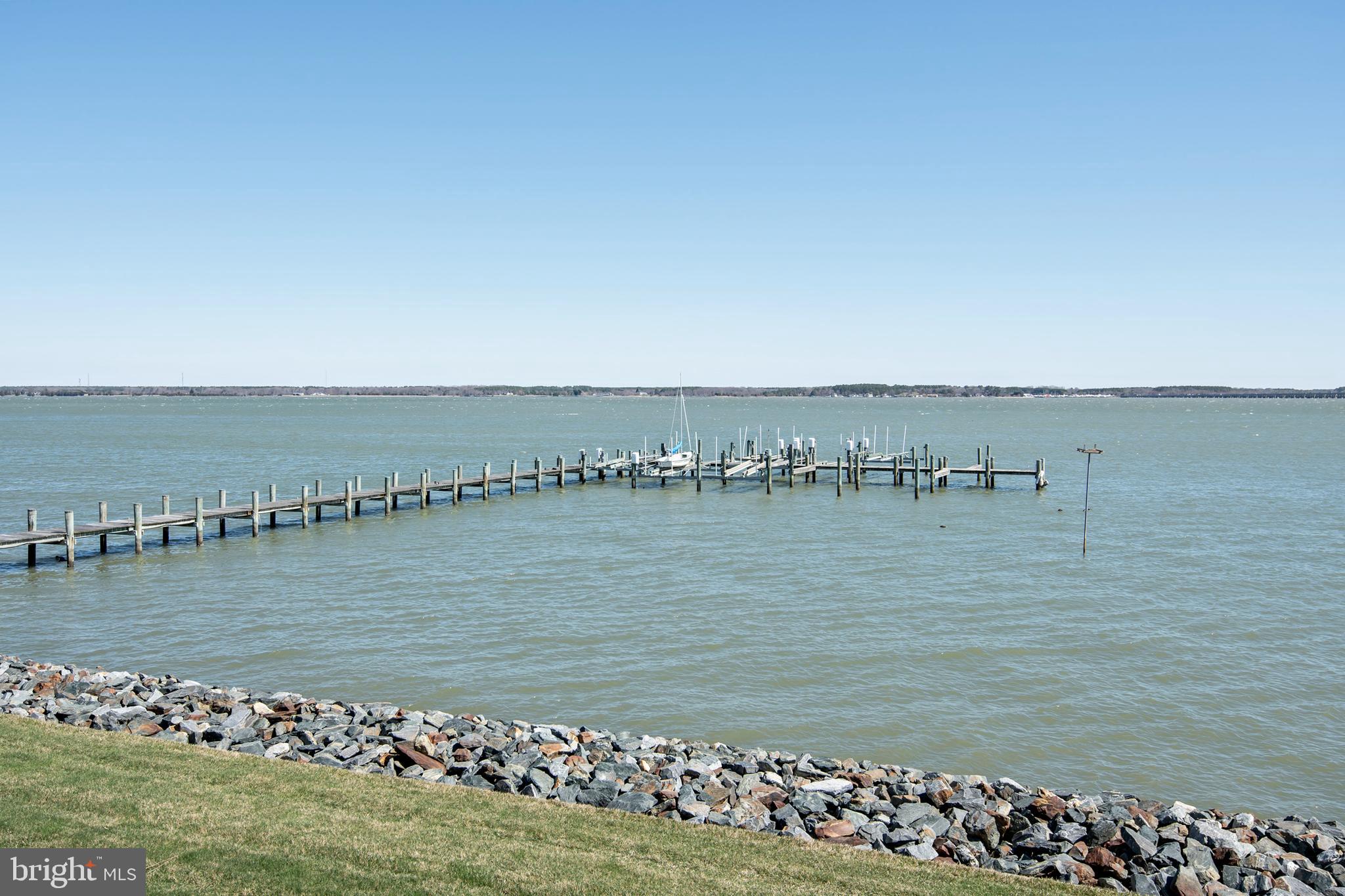 3 Oakley Street, Unit 201 Cambridge, MD 21613 - Photo 8 of 41 a view of a large body of water with lots of green space