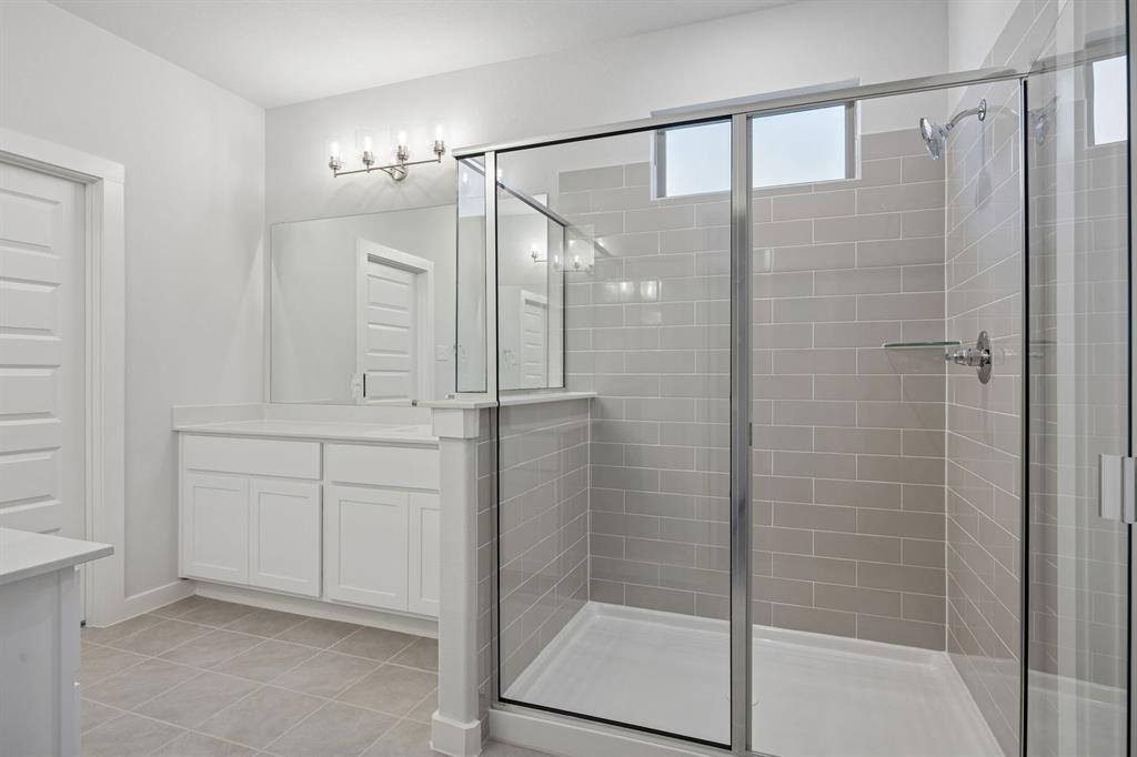 1477 Companero Street Haslet, TX 76052 - Photo 17 of 35 Primary Bathroom in the Wimbledon home plan by Trophy Signature Homes – REPRESENTATIVE PHOTO