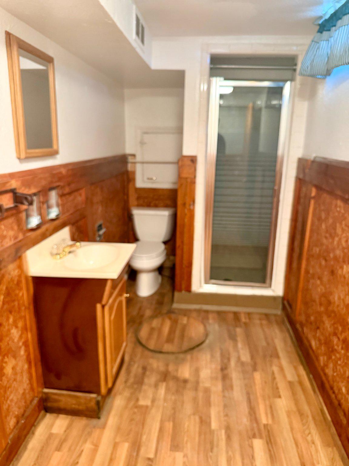 6318 Winner Avenue Baltimore, MD 21215 - Photo 57 of 75 a bathroom with a sink and a mirror