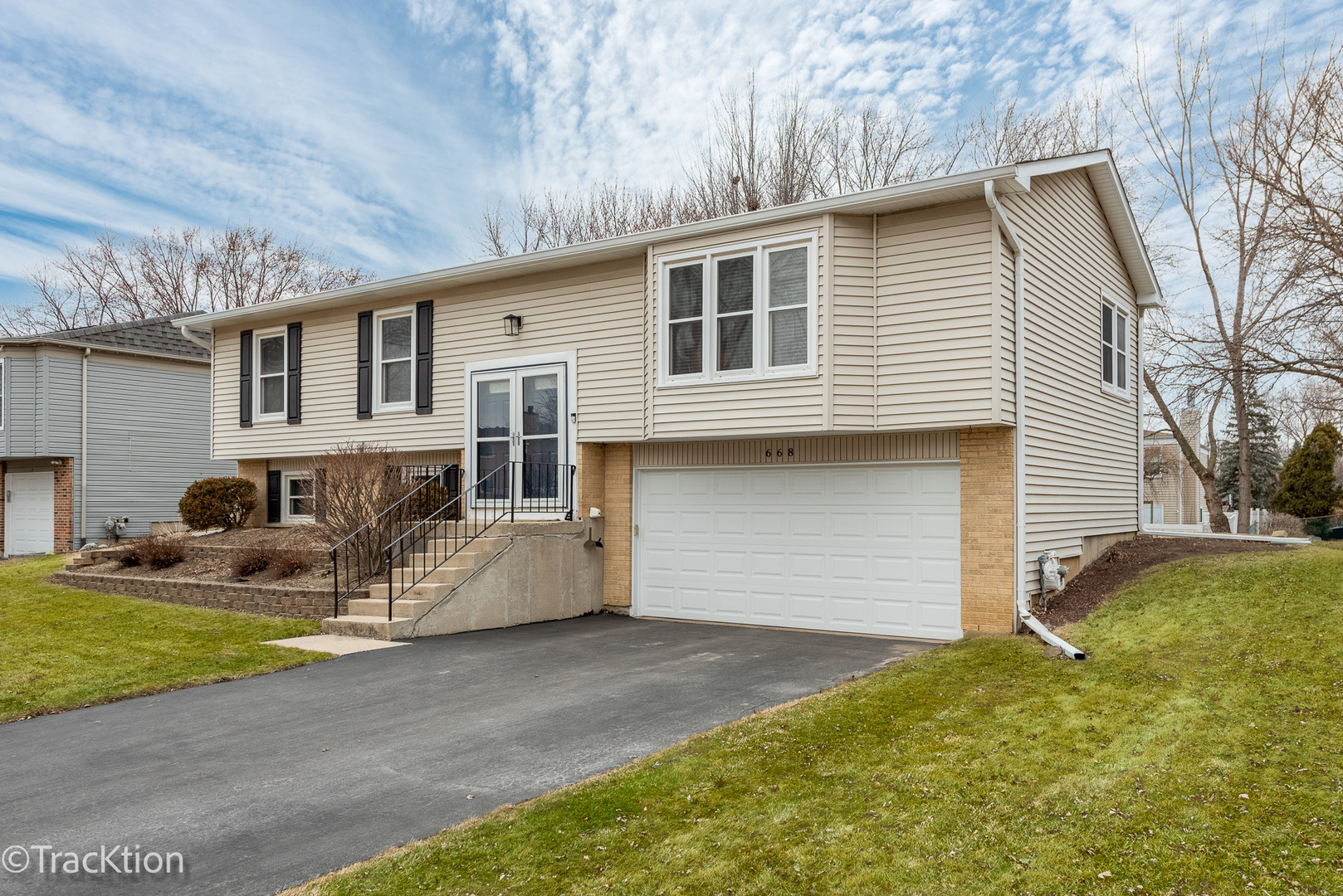 668 Londonberry Lane Bolingbrook, IL 60440 - Photo 1 of 1 a front view of a house with patio