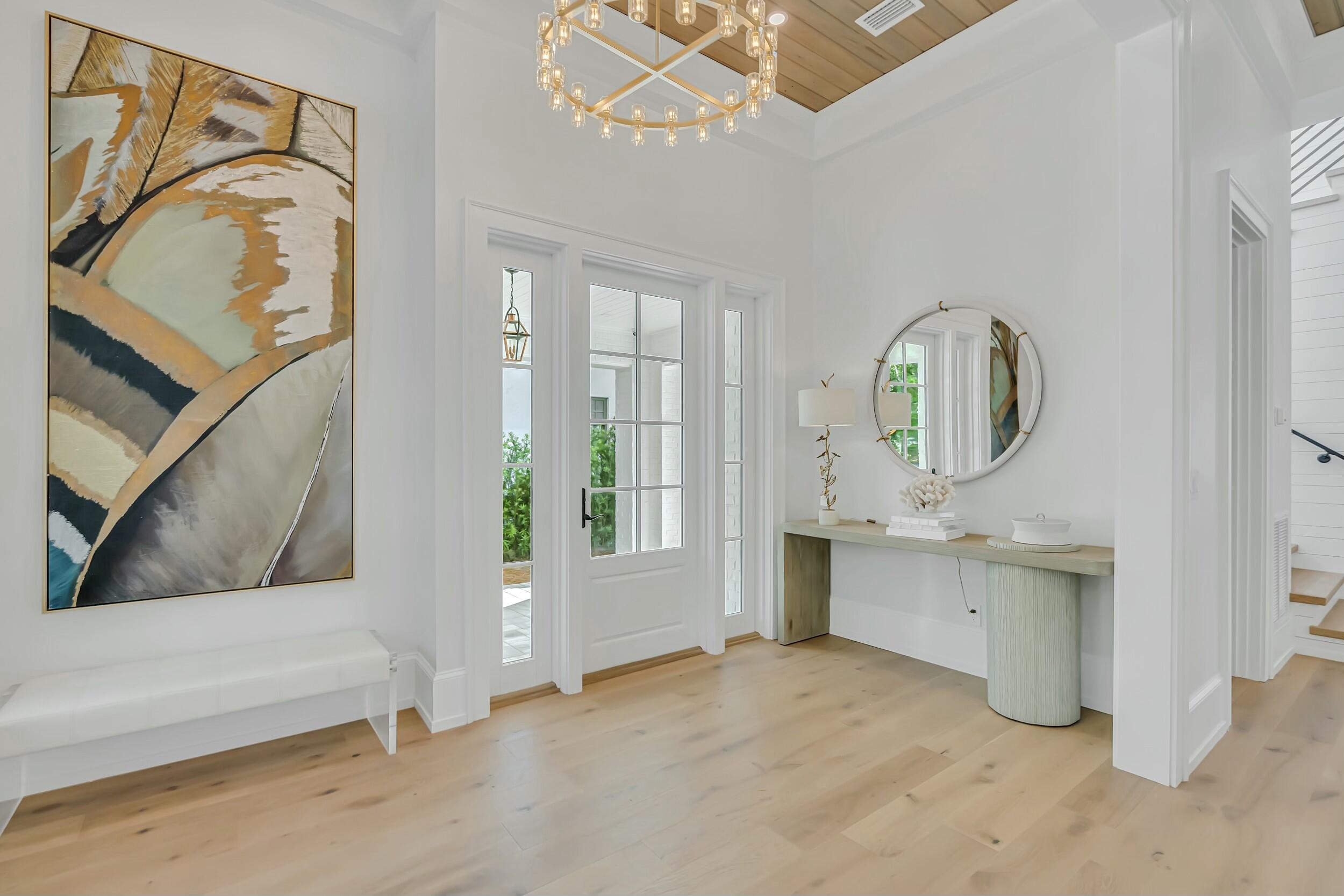 13 Tyler Drive Santa Rosa Beach, FL 32459 - Photo 11 of 78 a bathroom with a granite countertop sink mirror and bathtub