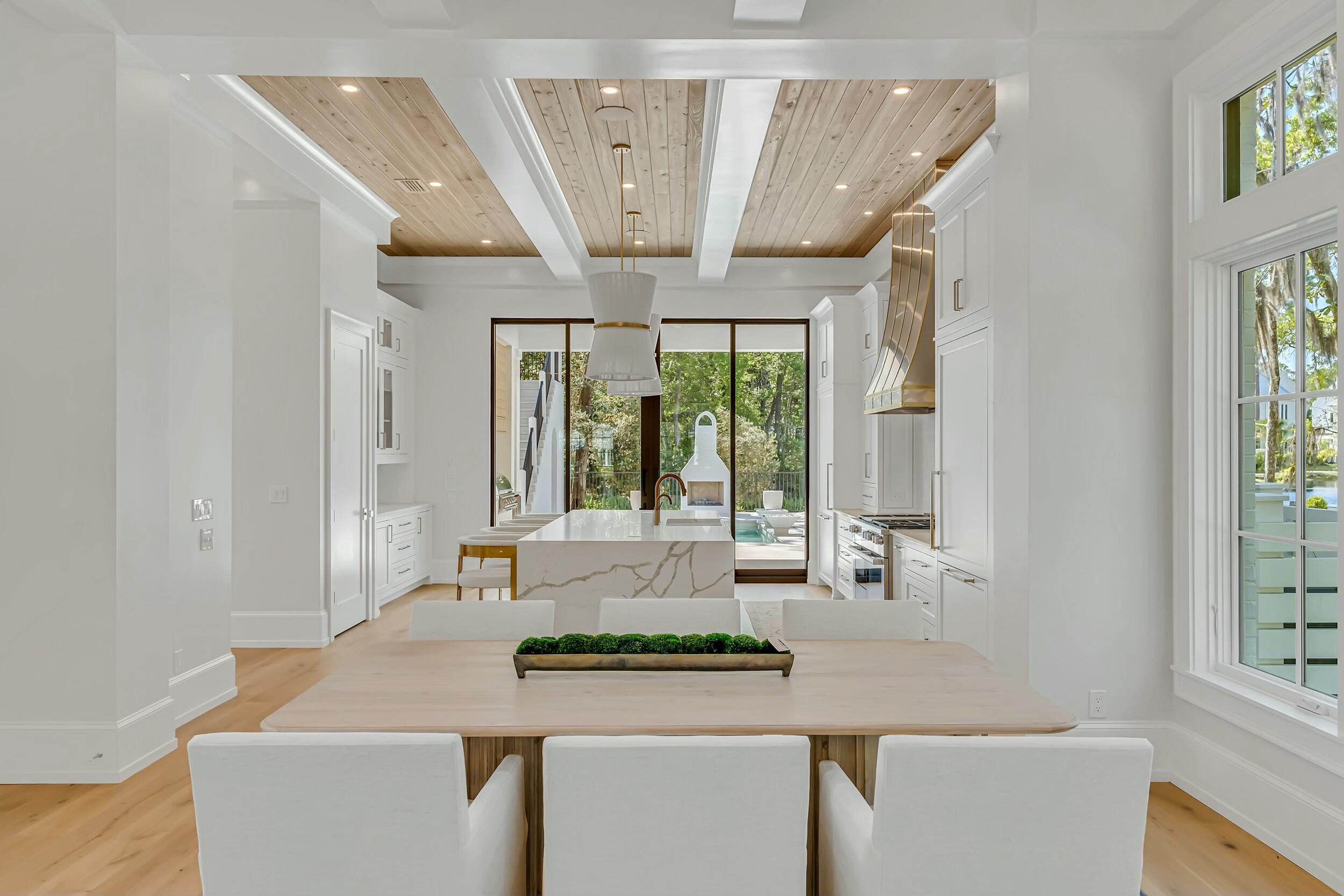 13 Tyler Drive Santa Rosa Beach, FL 32459 - Photo 17 of 78 a kitchen with stainless steel appliances granite countertop a sink and cabinets