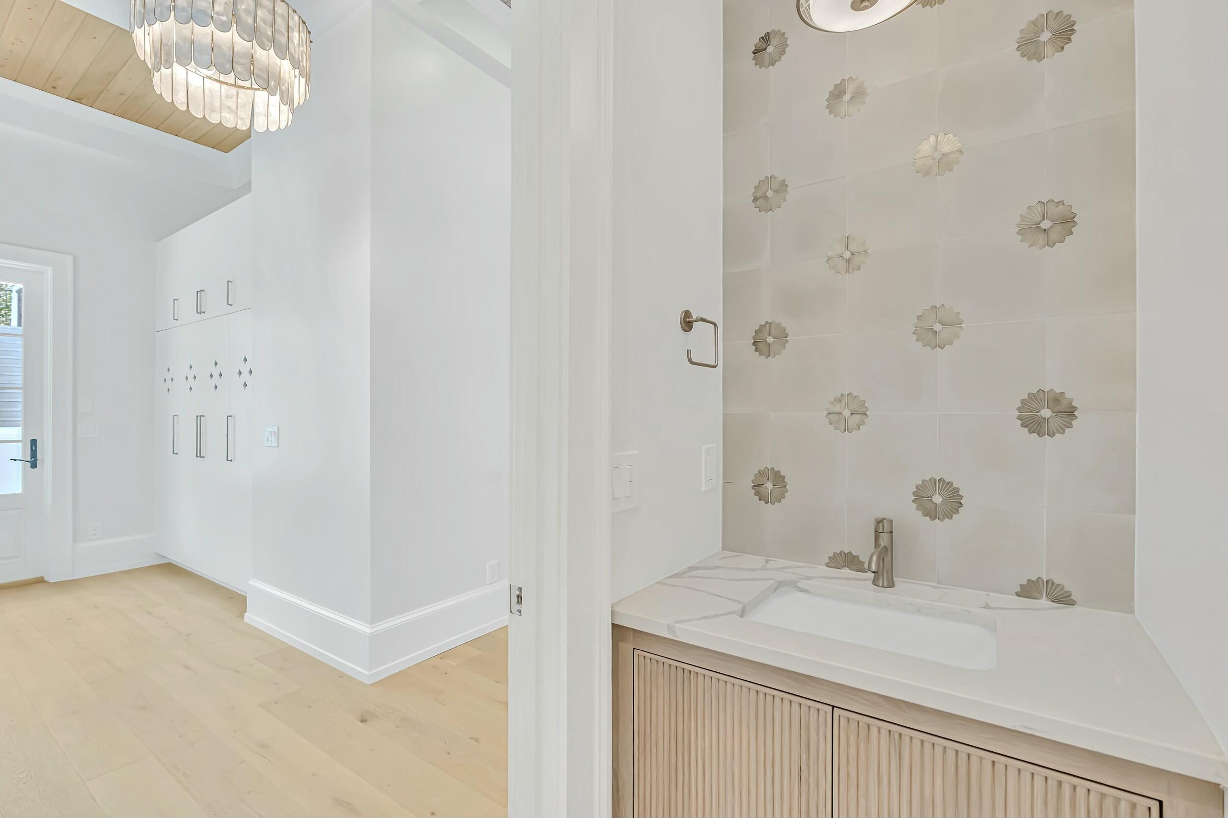 13 Tyler Drive Santa Rosa Beach, FL 32459 - Photo 29 of 78 a bathroom with a sink and a mirror