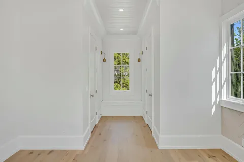 a kitchen with a stove a sink and a refrigerator