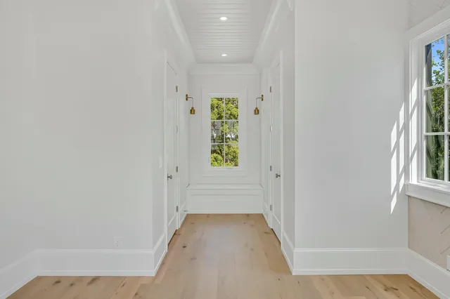 a kitchen with a stove a sink and a refrigerator
