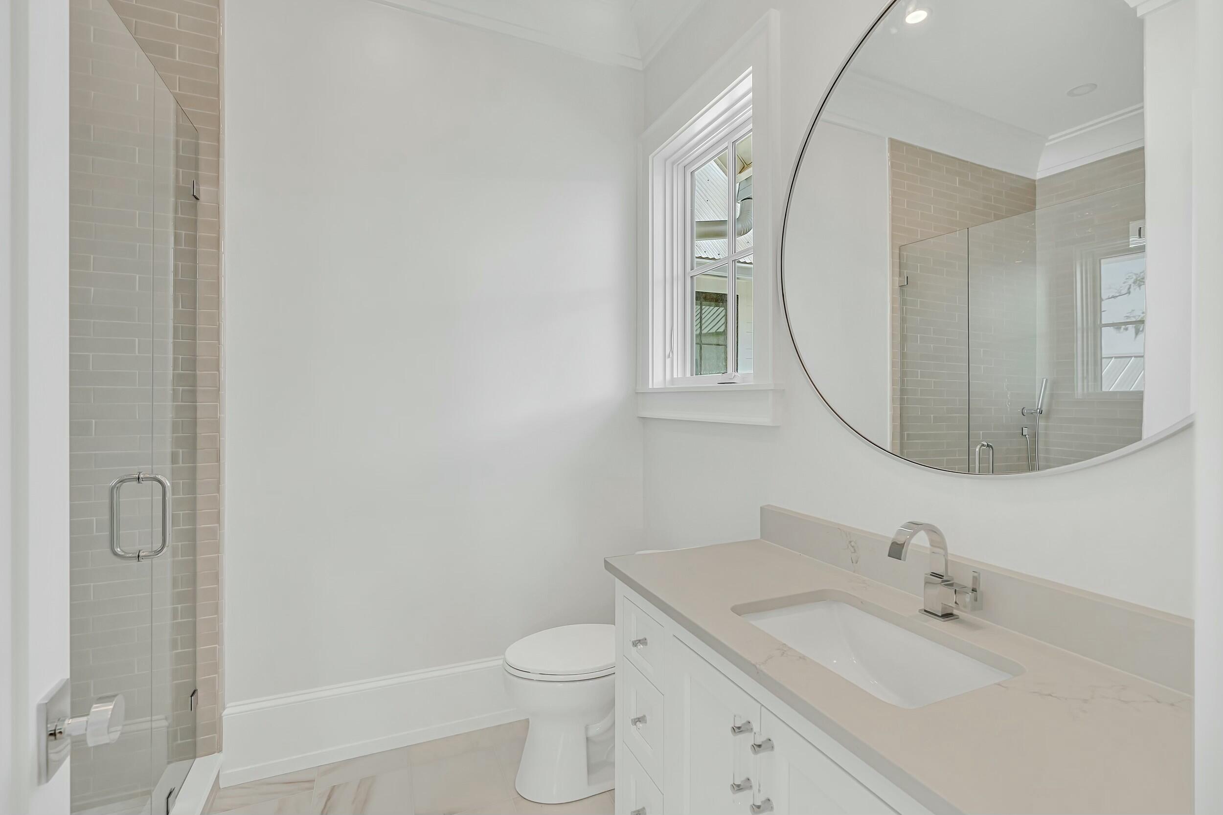 13 Tyler Drive Santa Rosa Beach, FL 32459 - Photo 47 of 78 a bathroom with a sink toilet and shower