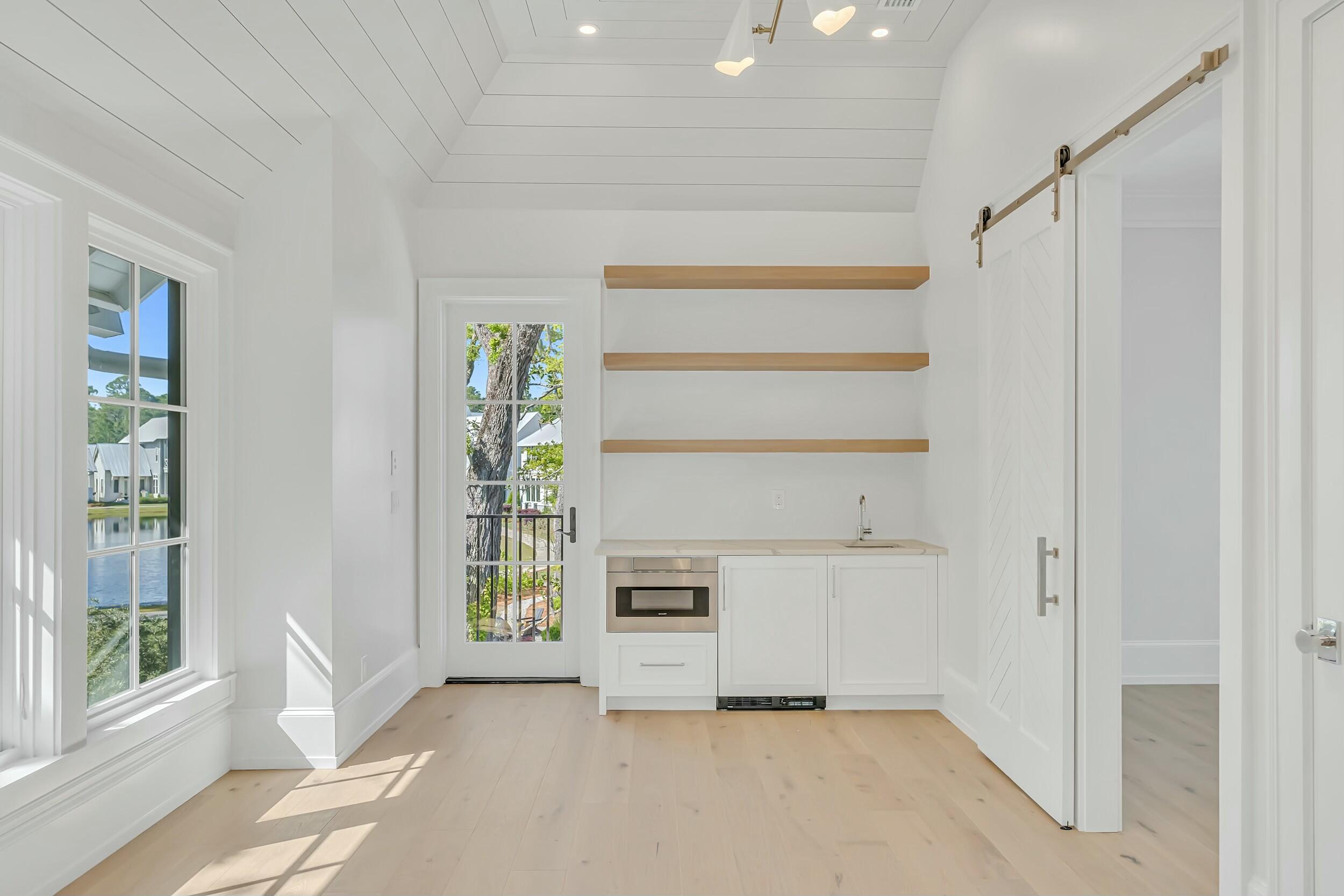 13 Tyler Drive Santa Rosa Beach, FL 32459 - Photo 60 of 78 a view of a kitchen with a sink and a window