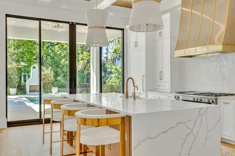 a front view of a house with a swimming pool