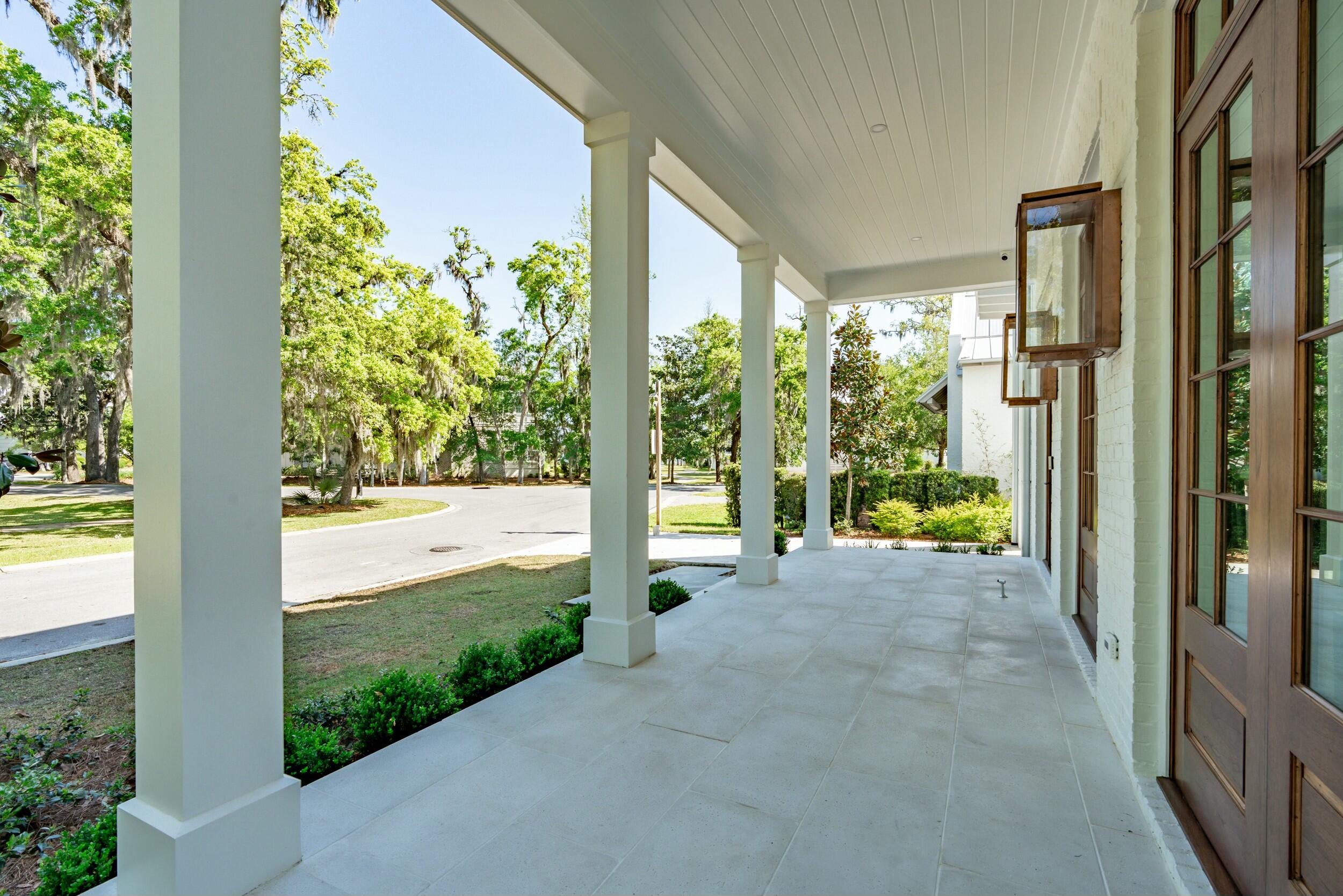 13 Tyler Drive Santa Rosa Beach, FL 32459 - Photo 8 of 78 a view of a room with floor to ceiling windows and wooden floor