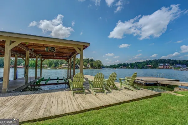 a view of a swimming pool with a patio