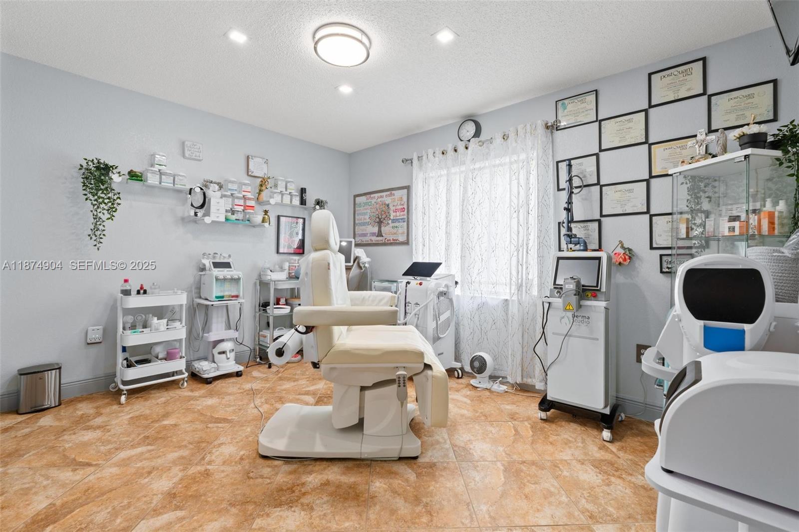 16034 Southwest 83rd Terrace Miami, FL 33193 - Photo 19 of 30 a living room with furniture a couch and a table