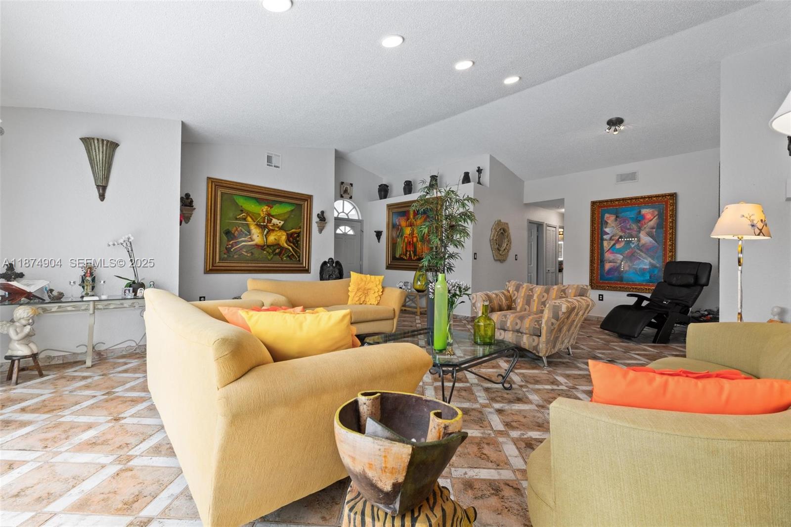 16034 Southwest 83rd Terrace Miami, FL 33193 - Photo 3 of 30 a living room with furniture and painting on the wall
