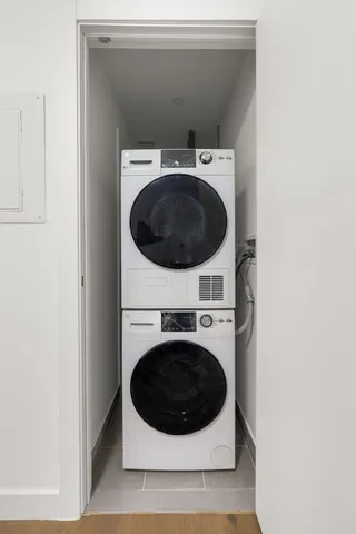 a utility room with dryer and washer
