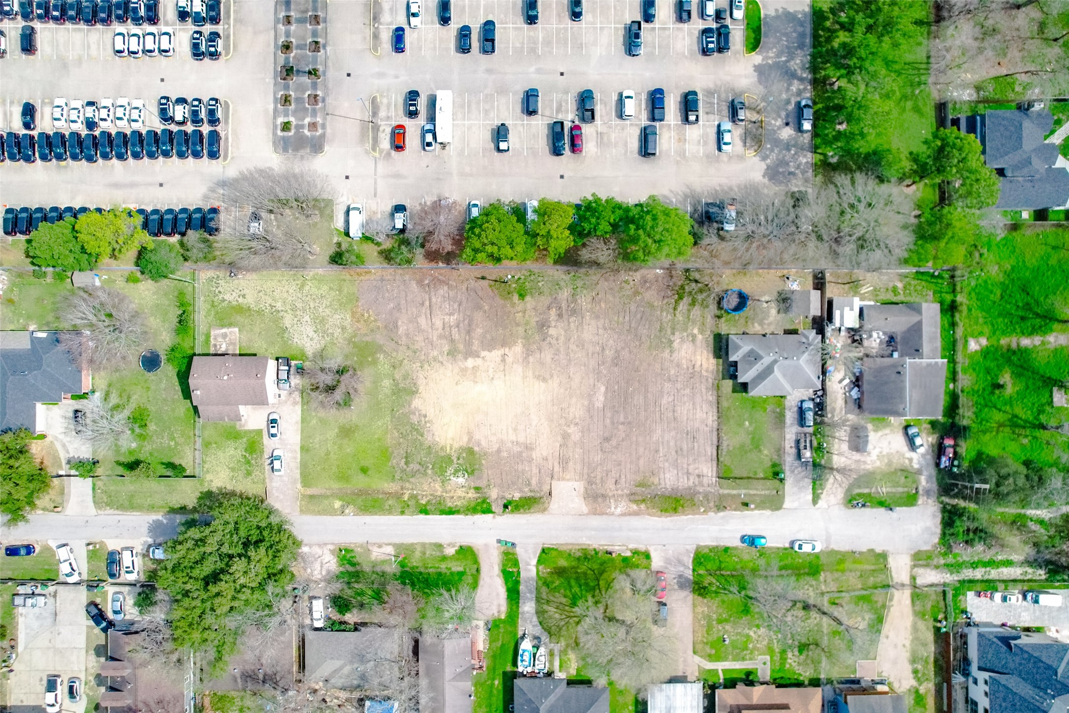 8524 Observatory Street Houston, TX 77088 - Photo 12 of 17 an aerial view of multiple houses with a yard