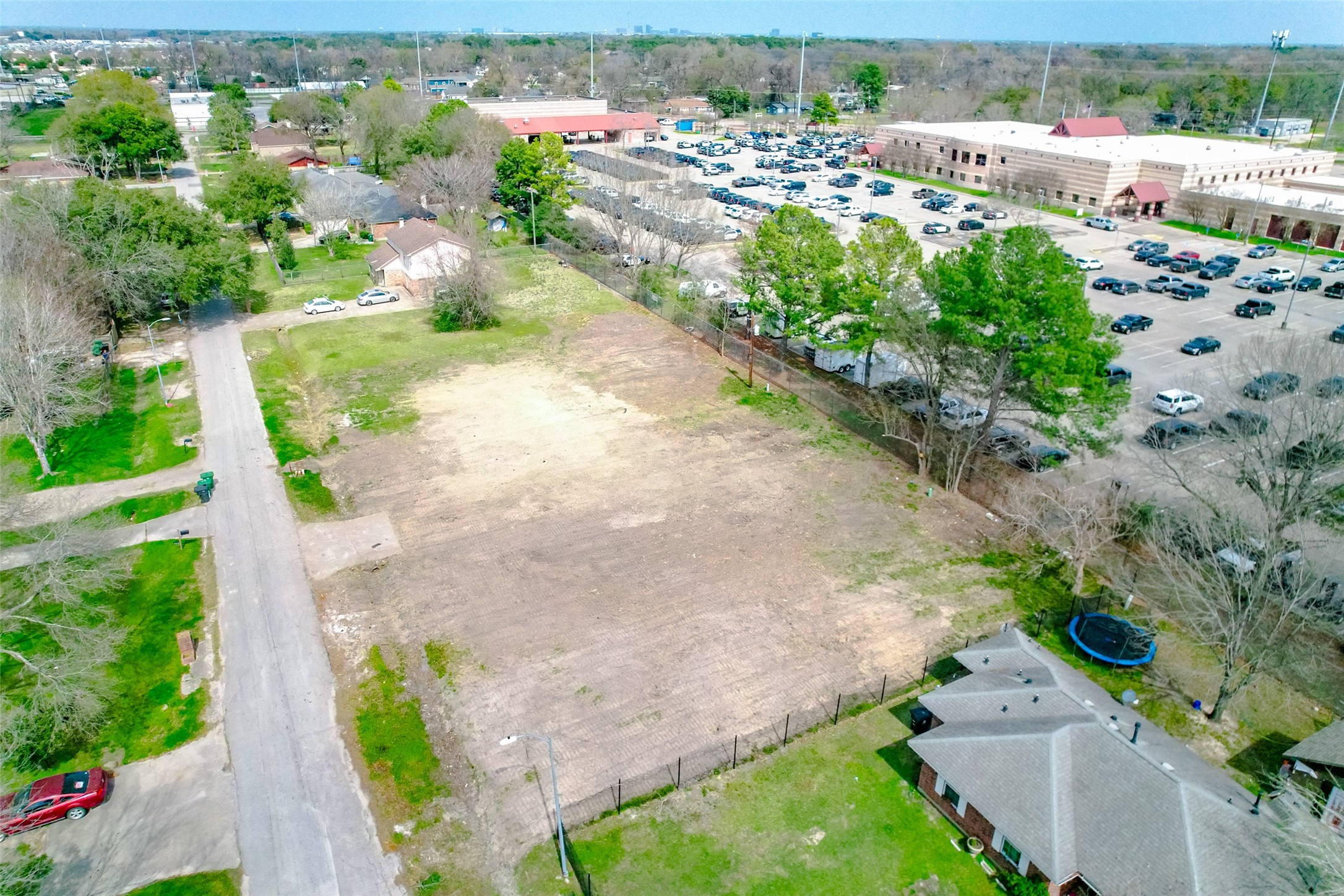 8524 Observatory Street Houston, TX 77088 - Photo 14 of 17 an aerial view of a house with a yard and lake view