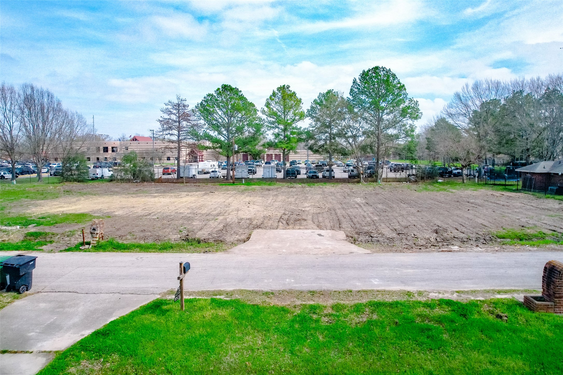 8524 Observatory Street Houston, TX 77088 - Photo 4 of 17 a view of a yard with a fountain in the background