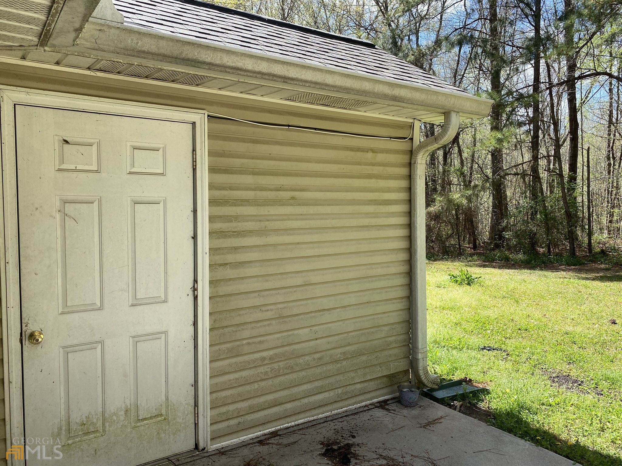 63 West Mandeville Road Carrollton, GA 30117 - Photo 4 of 6 a view of a back yard