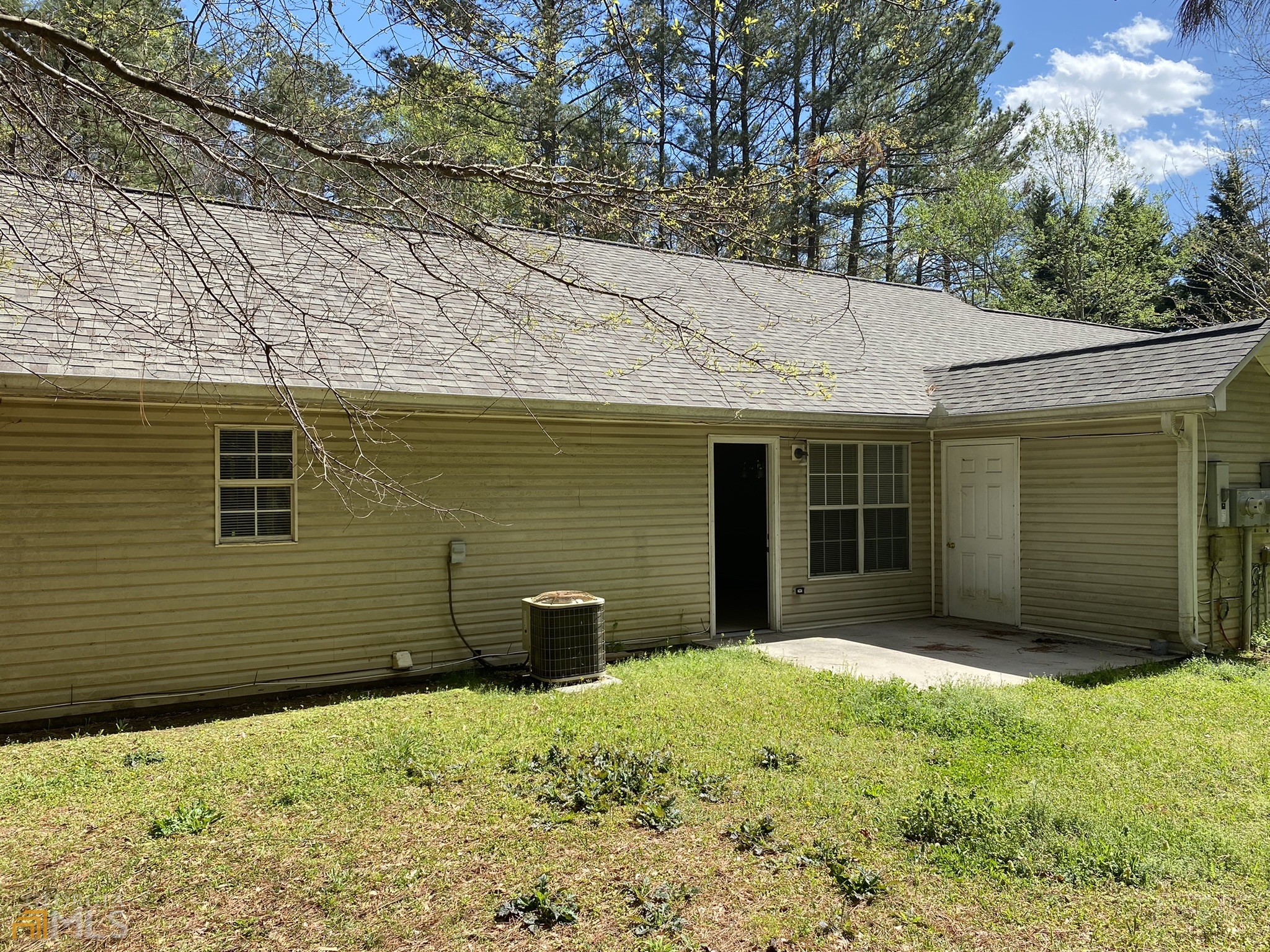 63 West Mandeville Road Carrollton, GA 30117 - Photo 6 of 6 a view of a house with a yard