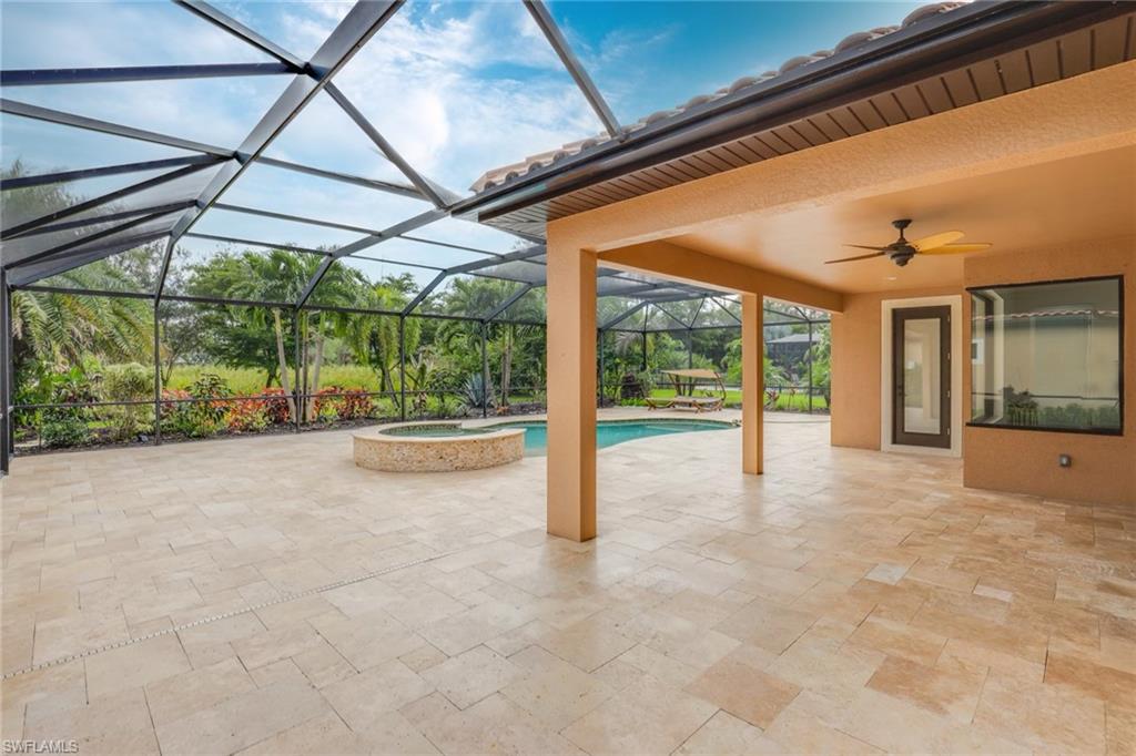 1584 Mockingbird Drive Naples, FL 34120 - Photo 39 of 40 a view of a room with porch and wooden floor