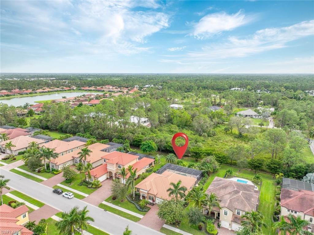 1584 Mockingbird Drive Naples, FL 34120 - Photo 5 of 40 an aerial view of a city