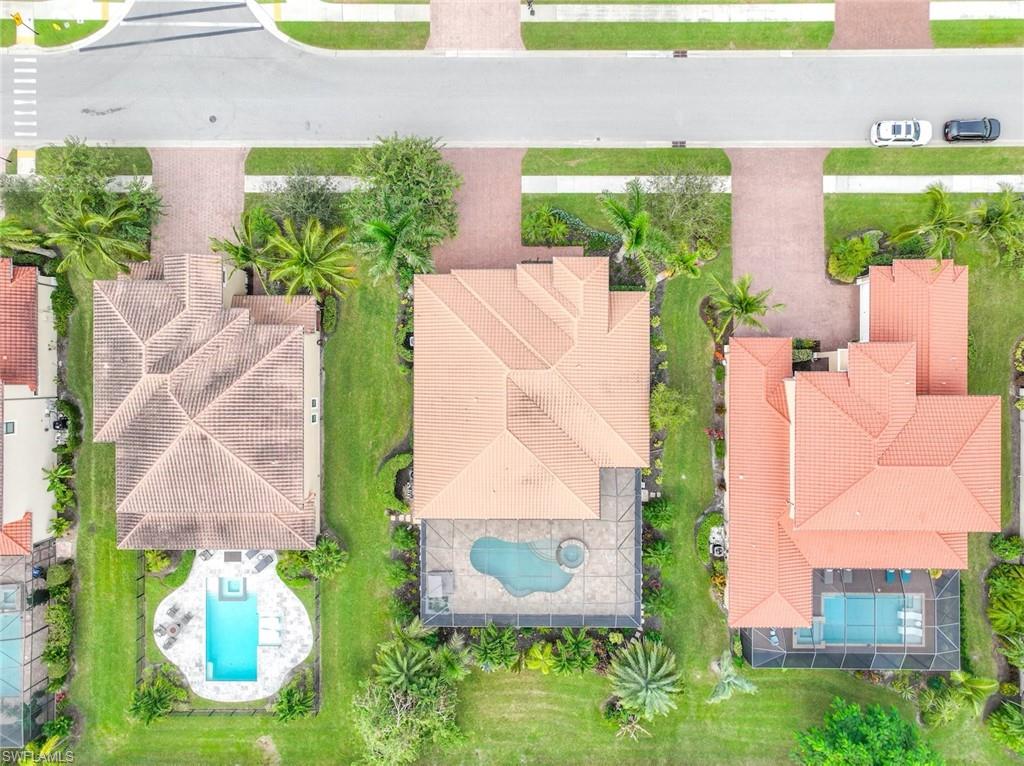 1584 Mockingbird Drive Naples, FL 34120 - Photo 6 of 40 an aerial view of a house