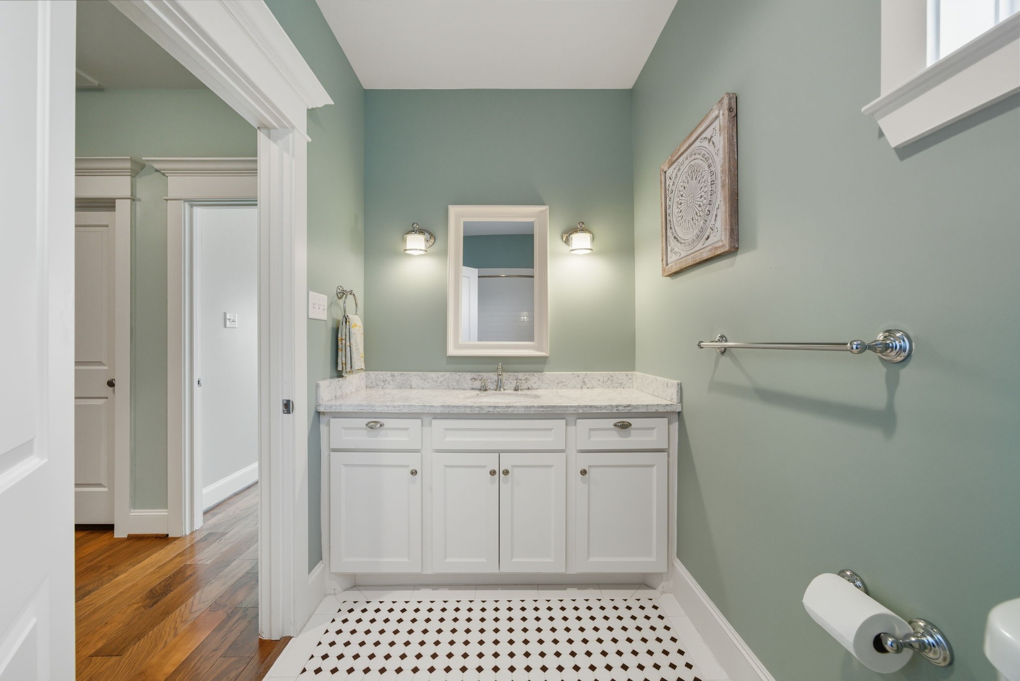 2011 Crockett Street Houston, TX 77007 - Photo 22 of 26 Guest bathroom - white cabinets, marble counters, updated finishes