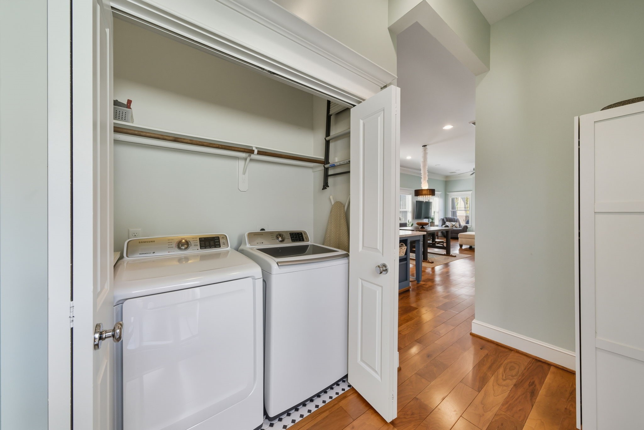 2011 Crockett Street Houston, TX 77007 - Photo 23 of 26 Back on the first floor, laundry space right off the primary bedroom - convenient, yet tucked away. Washer / dryer will convey