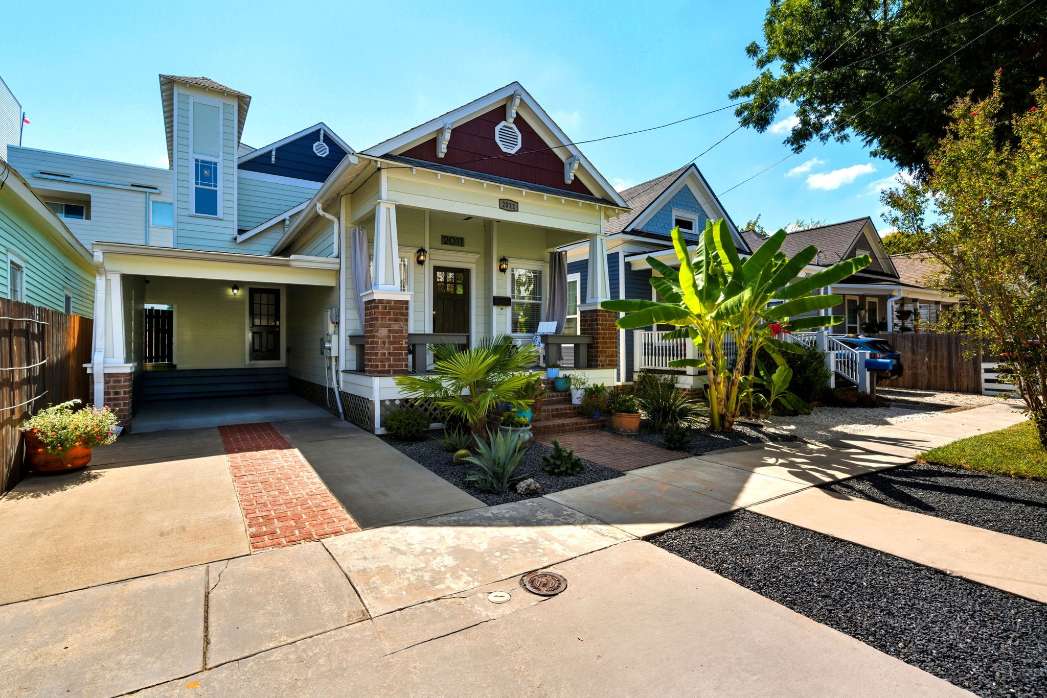 2011 Crockett Street Houston, TX 77007 - Photo 3 of 26 2021 – Exterior of the home repainted. 2025 – FULLY FENCED – NEW cedar fence built. Covered parking (1 car) with additional off-street parking for 2 cars