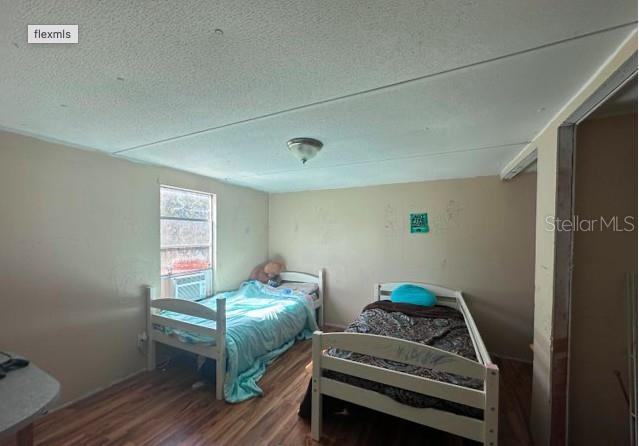 565 Southwest Daisy Road Lake City, FL 32024 - Photo 10 of 15 a living room with furniture and a wooden floor