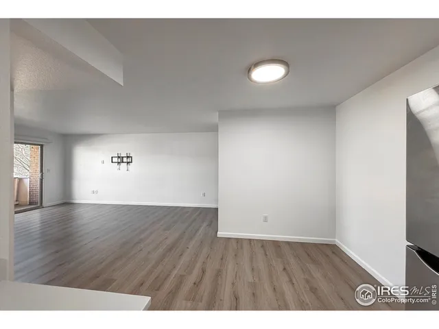 a kitchen with a sink appliances and cabinets