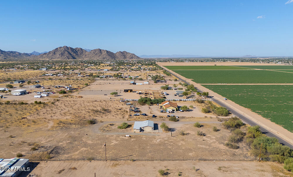 8926 North Thunderbird Road Maricopa, AZ 85139 - Photo 18 of 49 a view of a big yard with a large tree