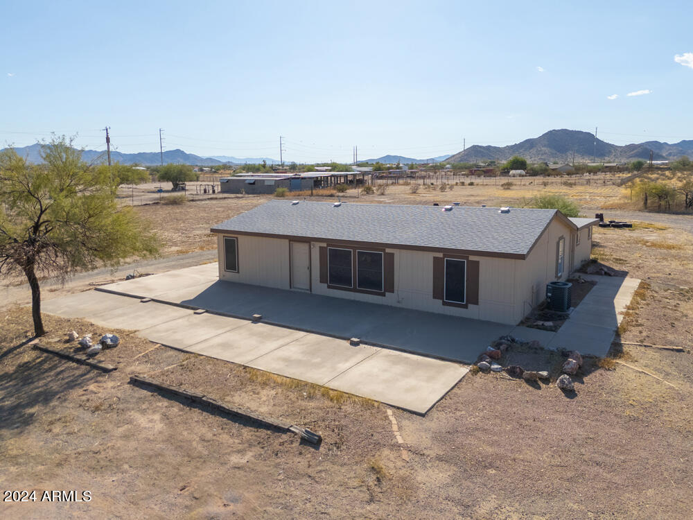 8926 North Thunderbird Road Maricopa, AZ 85139 - Photo 8 of 49 a view of a terrace with a lake view