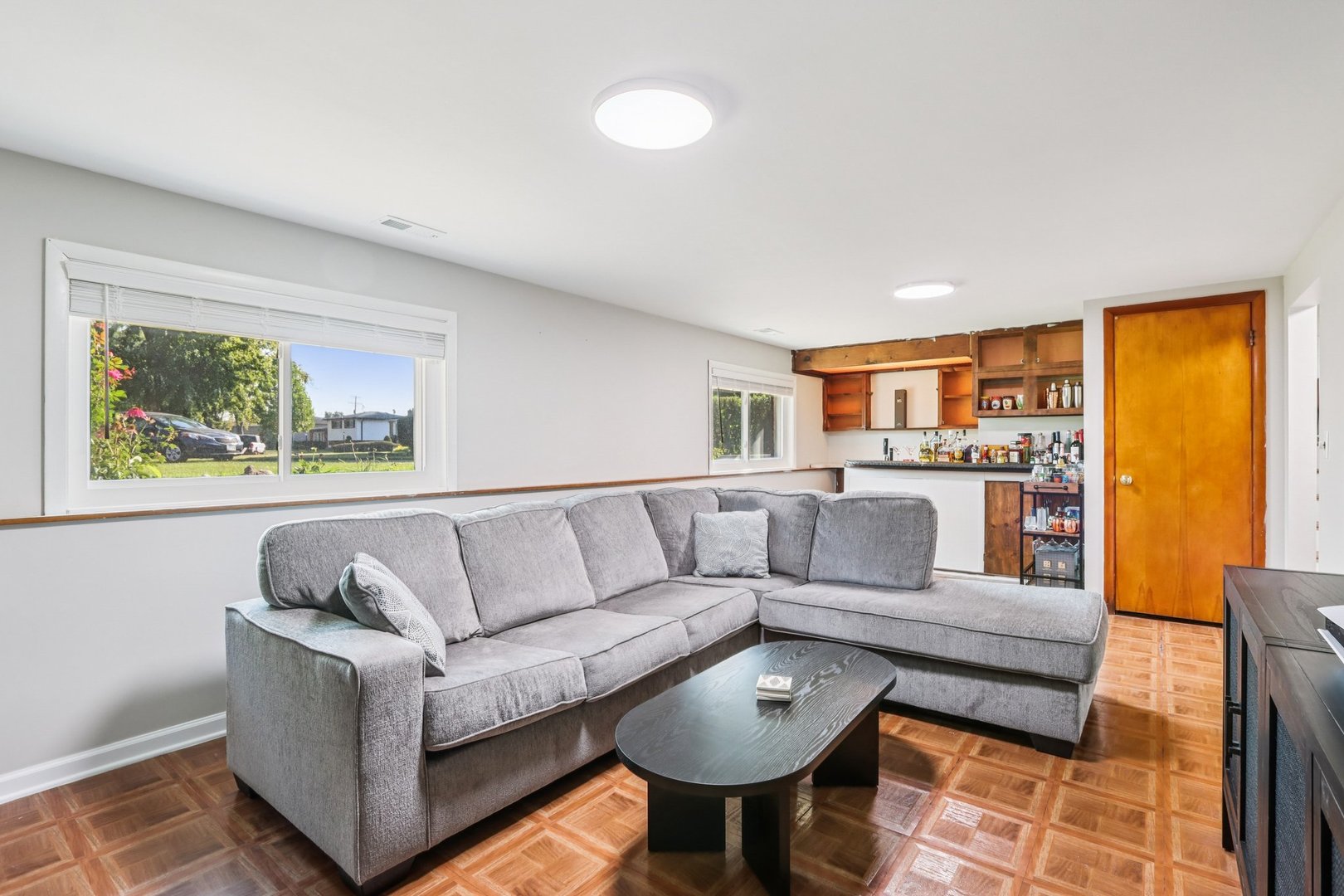 461 Ardmore Terrace Addison, IL 60101 - Photo 19 of 29 a living room with furniture and a large window